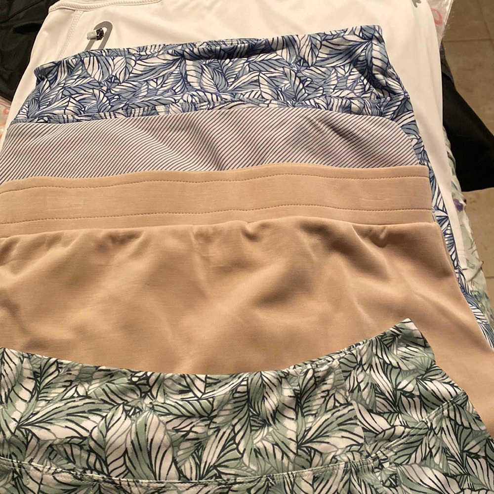 5 skirts . 2 printed L, sport shirts inside m, beige large , blue stripe large